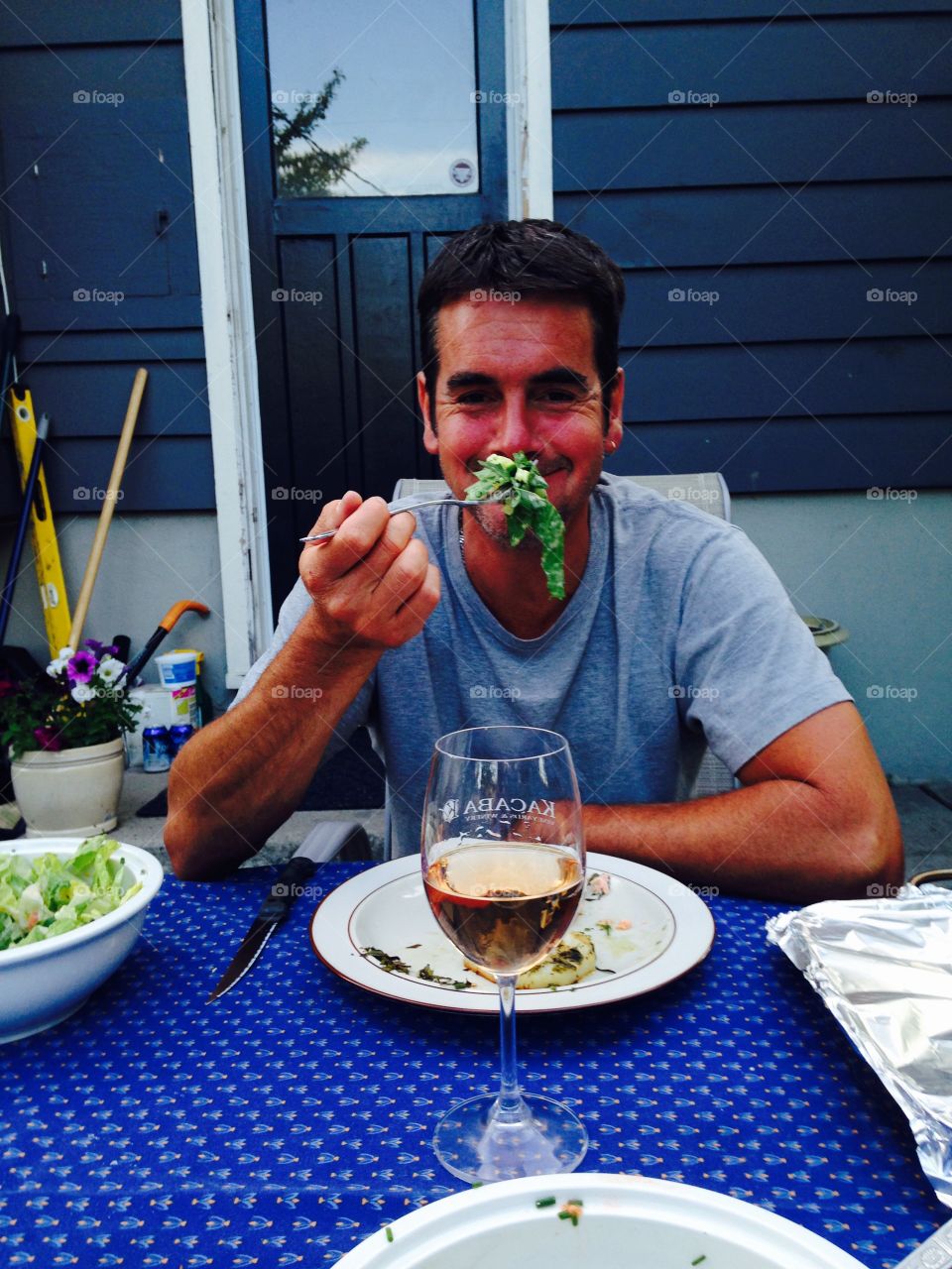 Man enjoying diner and wine 