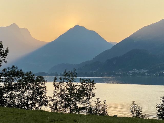 The sky broke like an egg into full sunset and the water caught fire.