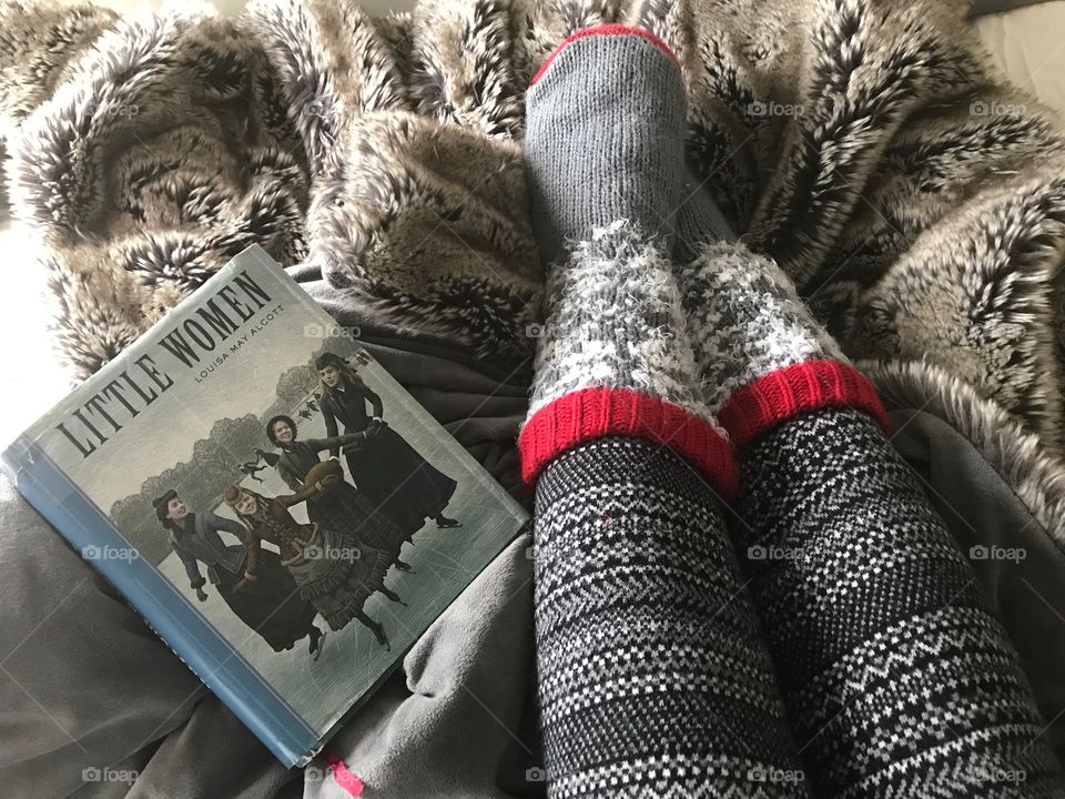 Cozy and comfy with the book, Little Women. This will help you relax into winter cheer. Fuzzy socks, print pants, and reading is the best combination!
