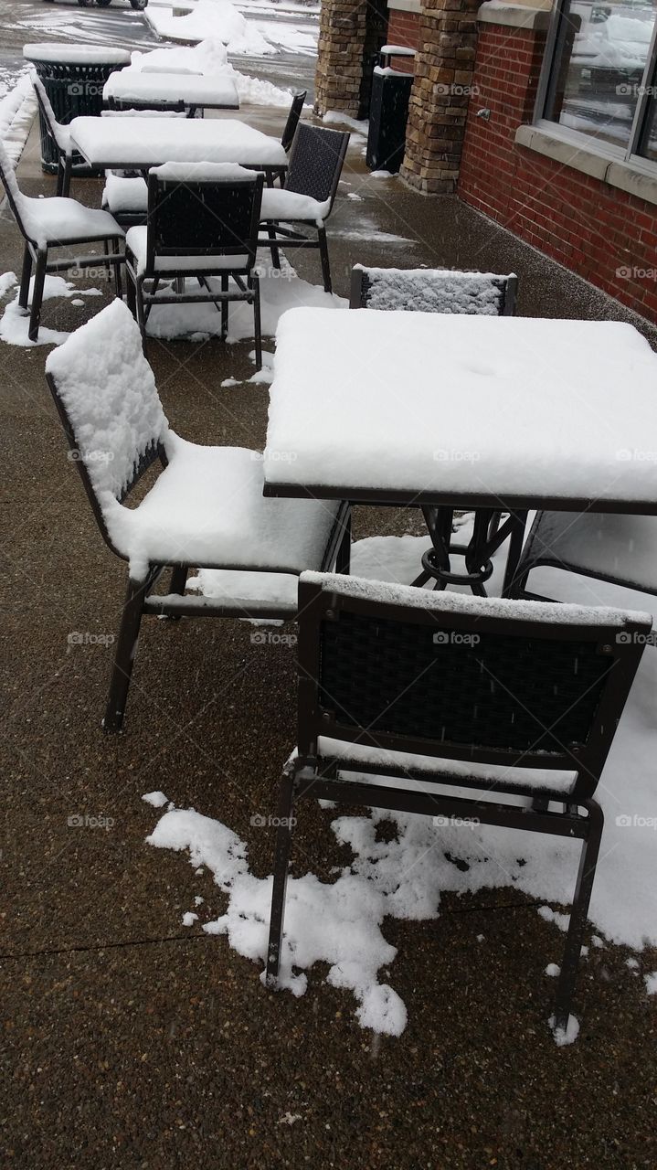 snow on bistro tables