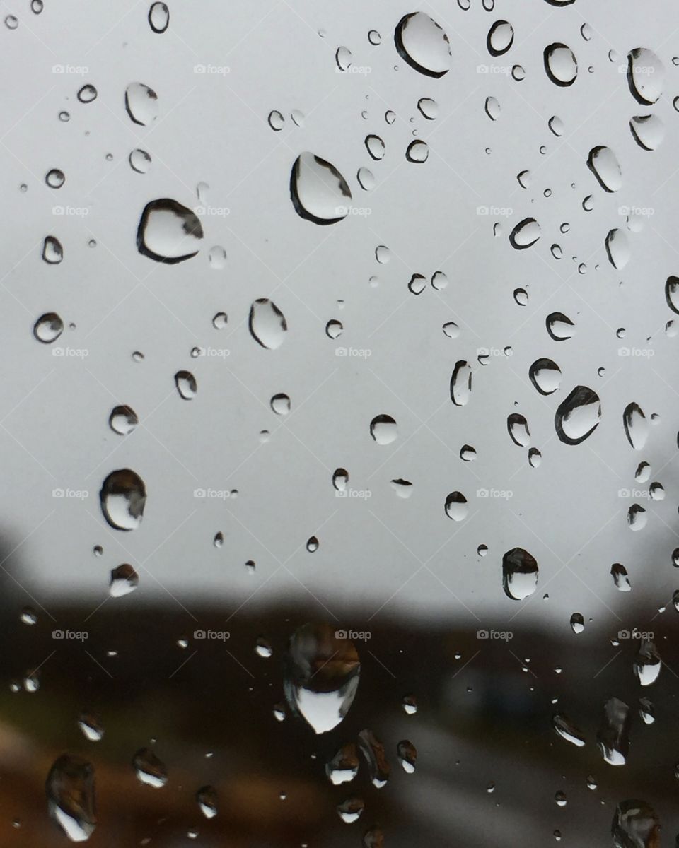 Close-up of water drop on glass window