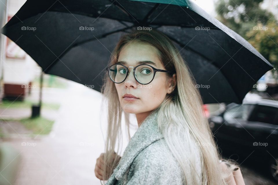 Woman holding umbrella