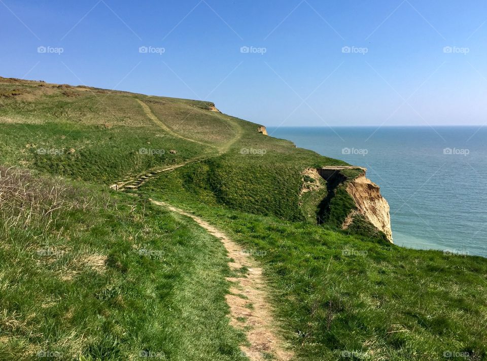 Pathway on cliff top by the sea