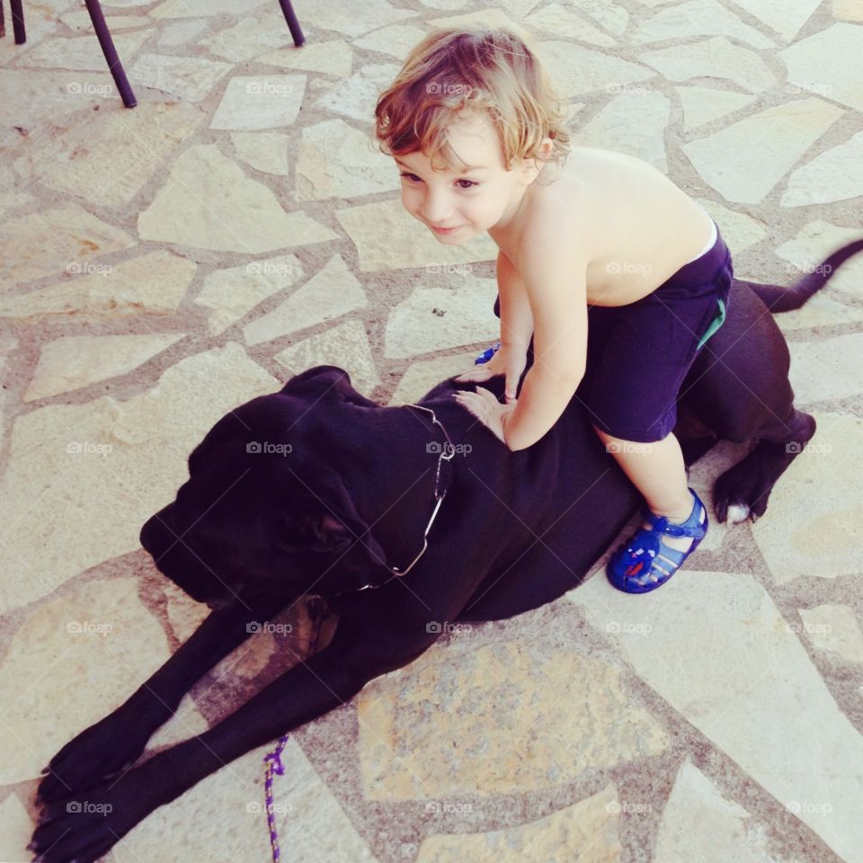 Kid with his dog 