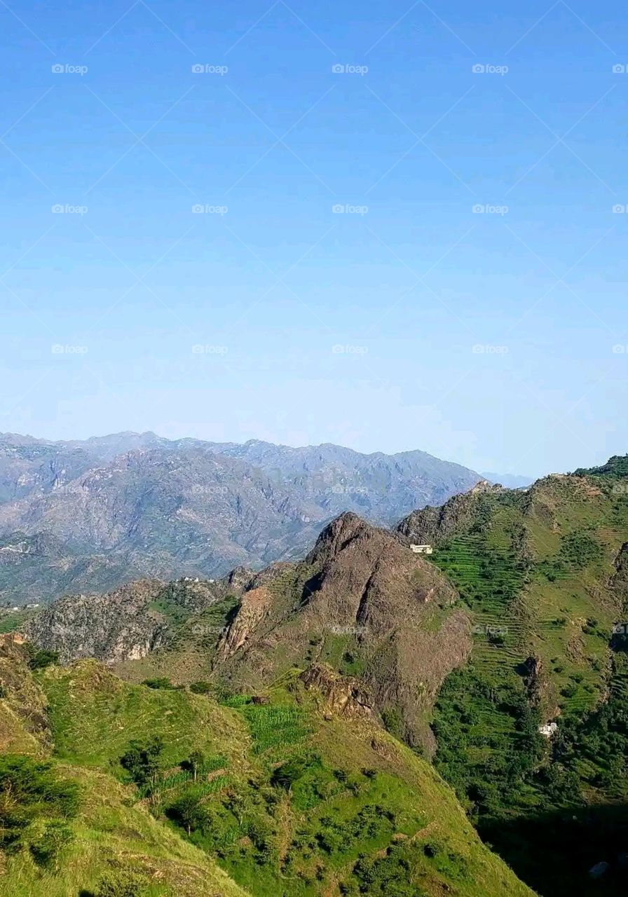 Glory be to God, the magnificent and picturesque view and the natural green trees are a view that is nothing more wonderful than it