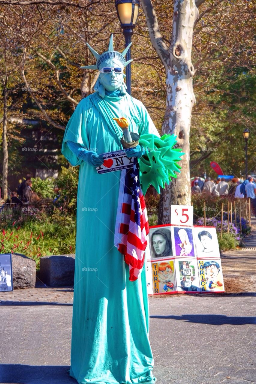 A human statue of Liberty 