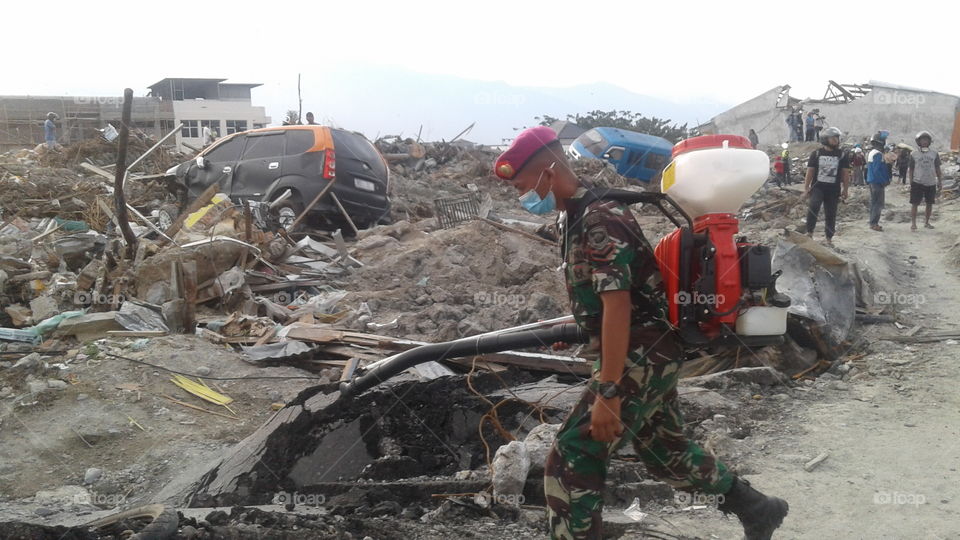 the army worked hard to recover areas damaged by the earthquake, tsunami and liquefaction in Palu, Central Sulawesi