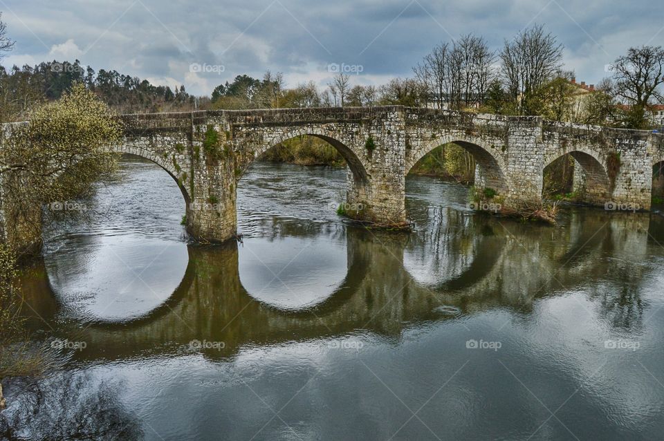 Bridge reflected on river