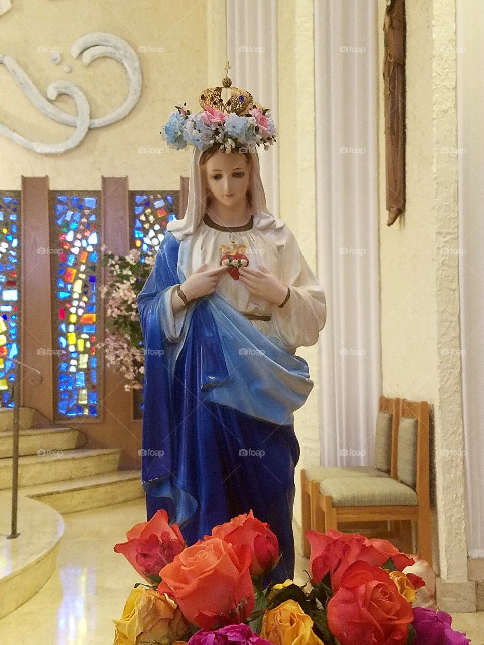 Flower crowned Mary statue