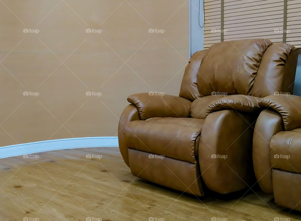 Chairs with soft corners  on the wooden floor.