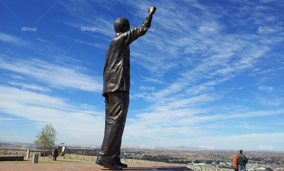 On a nice day mid winter in Bloemfontein in South Africa where the giant statue of Nelson Mandela towers over the city.