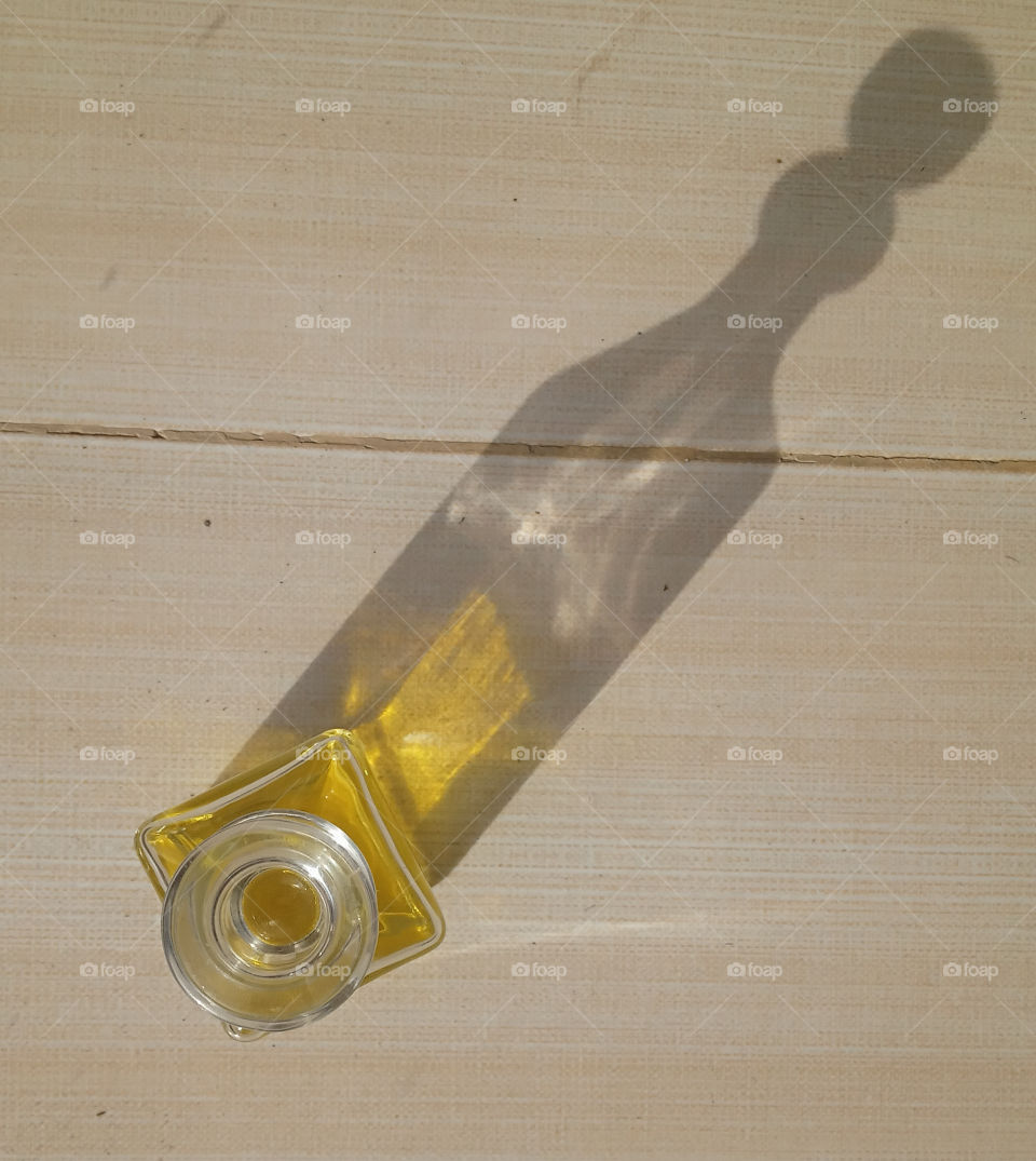 the shadow of parfume bottle