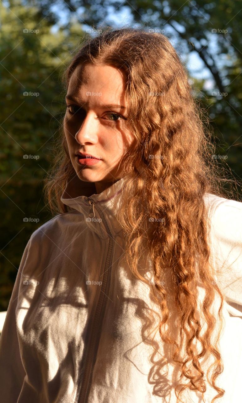 young girl beautiful portrait in sunlight