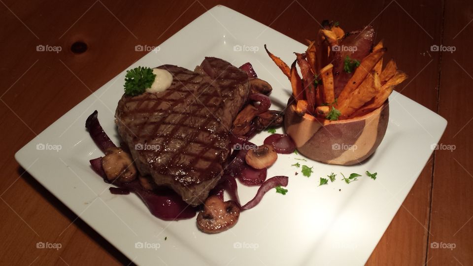 filet migon with mushrooms and sweet potato fries for dinner.