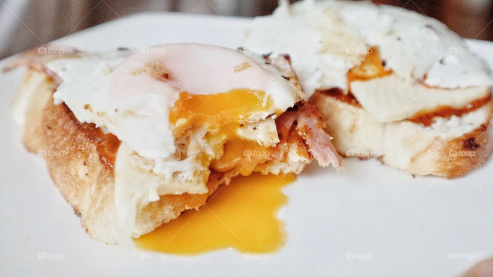 Homemade sandwich with eggs and bacon