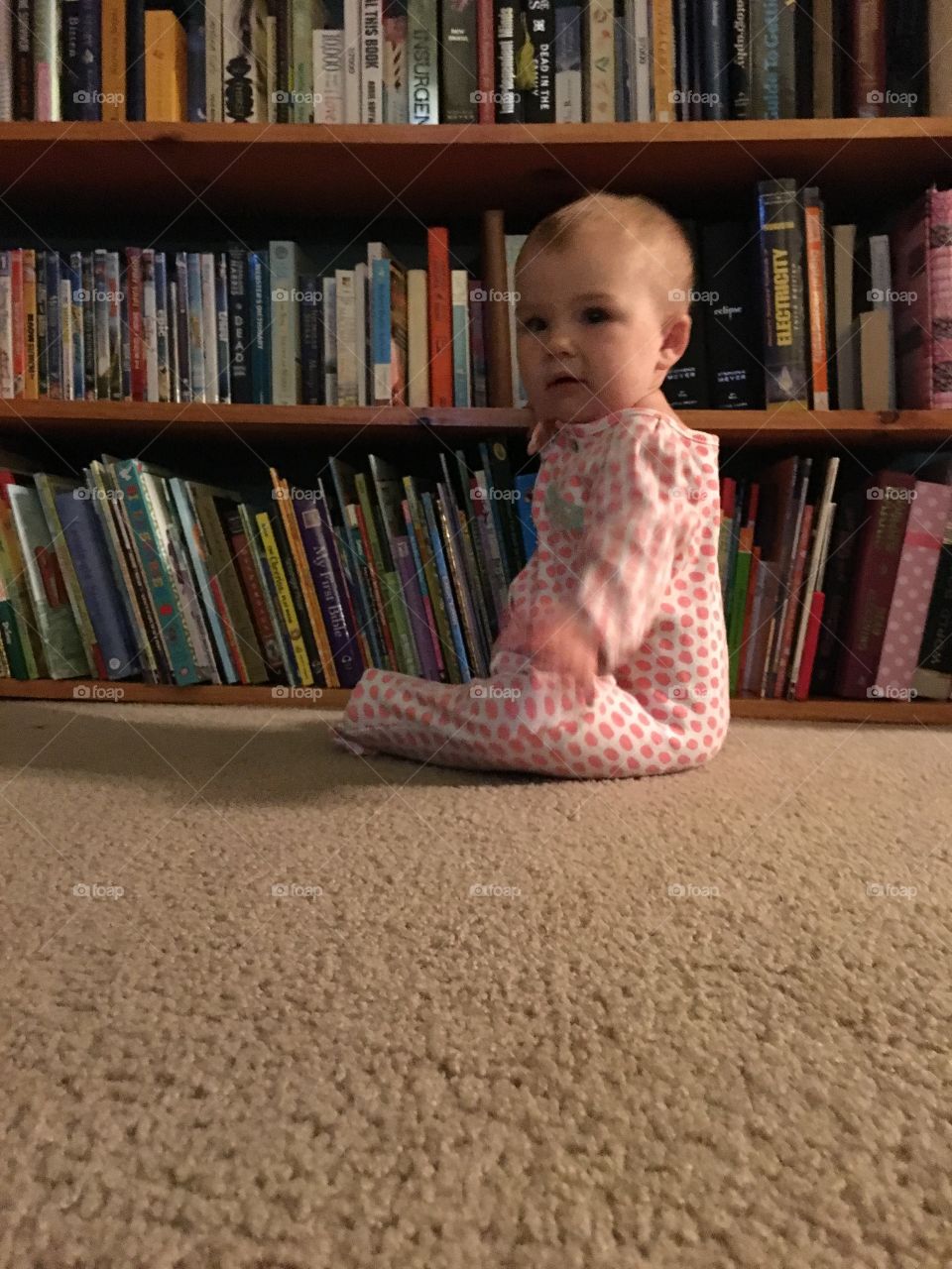 Baby and a bookshelf round 6 