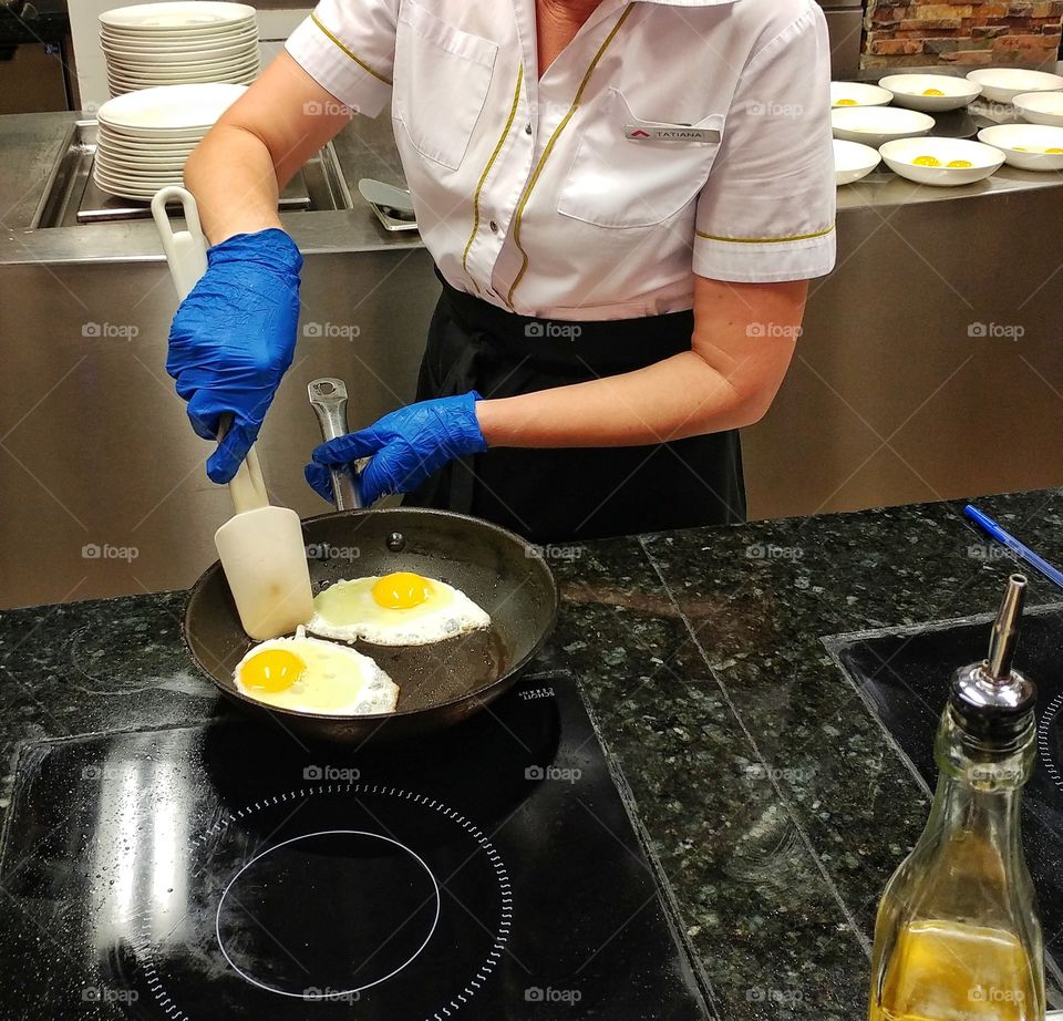 Every morning this cook was making omelets and frying eggs for us when we stayed at hotel. 