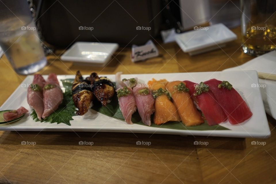 variety of nigiri sushi on a plate