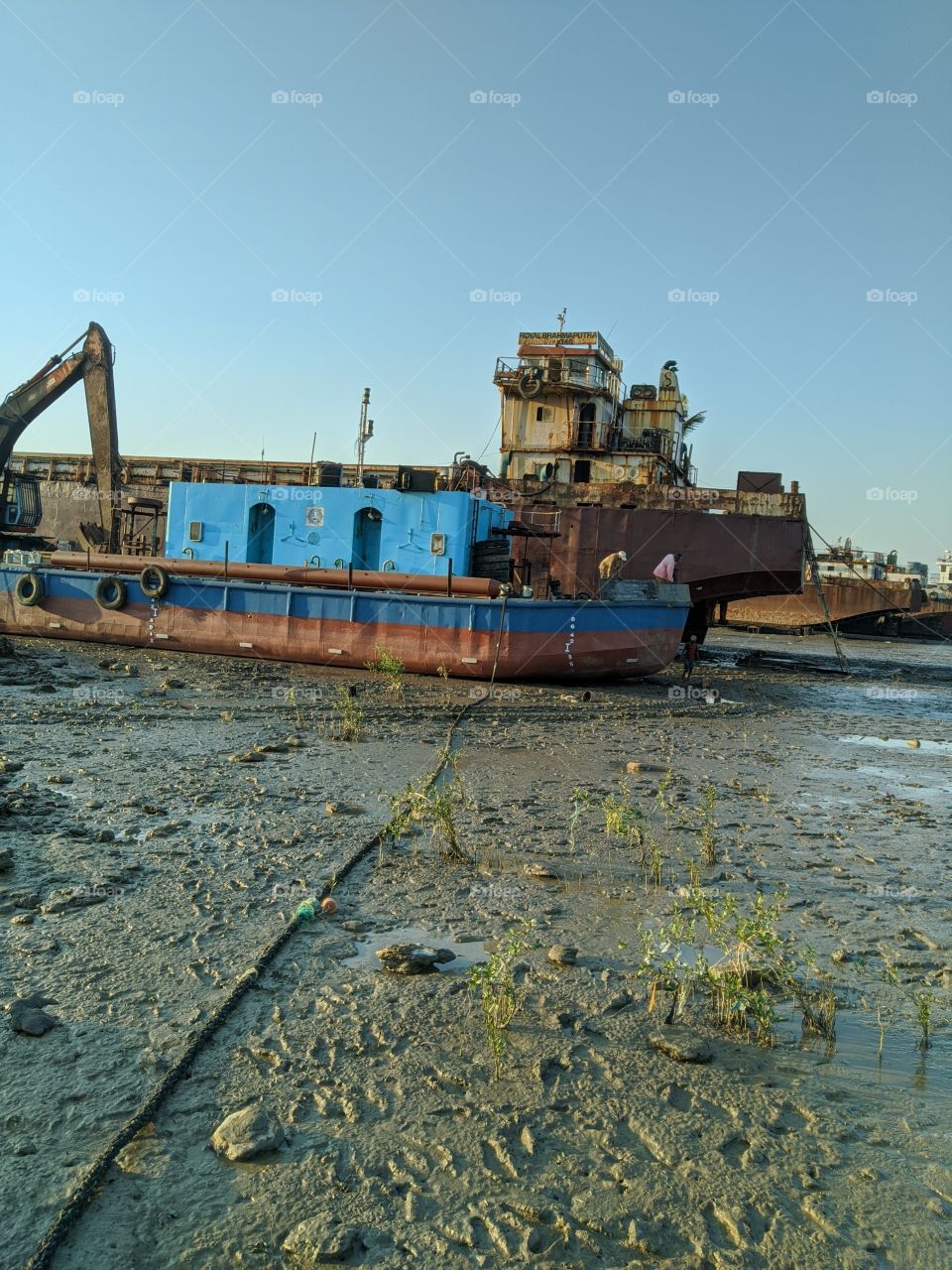 Small ship in bay of Ghogha