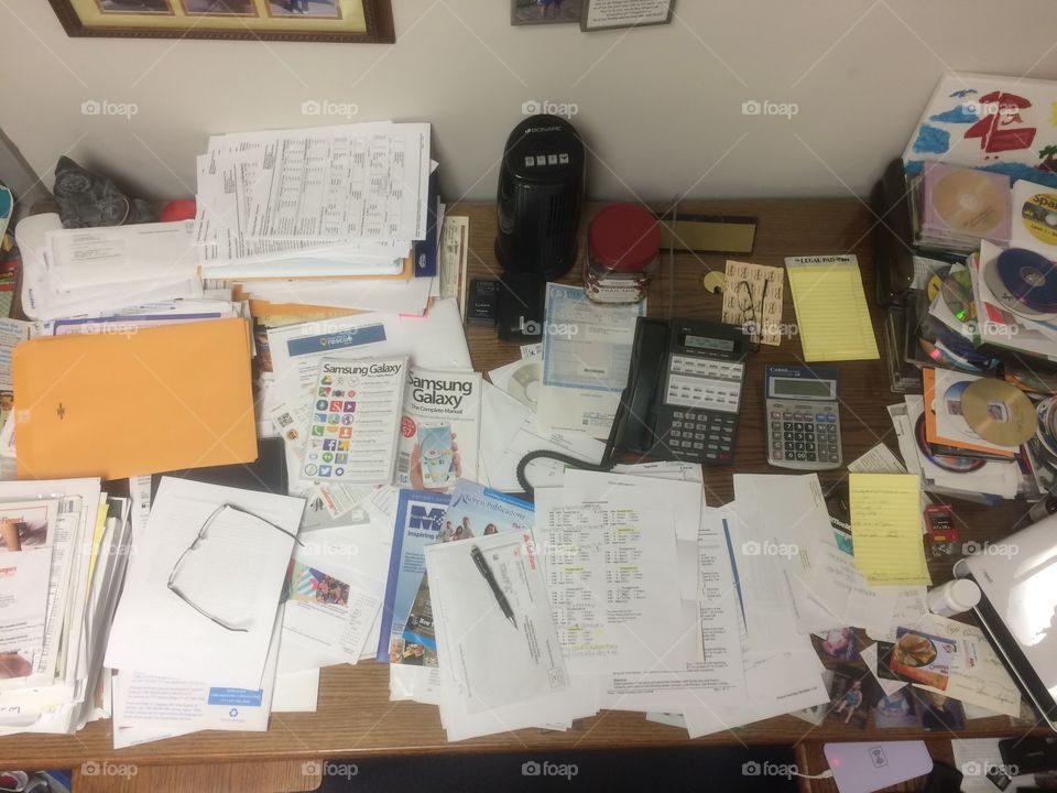 Desk full of paperwork