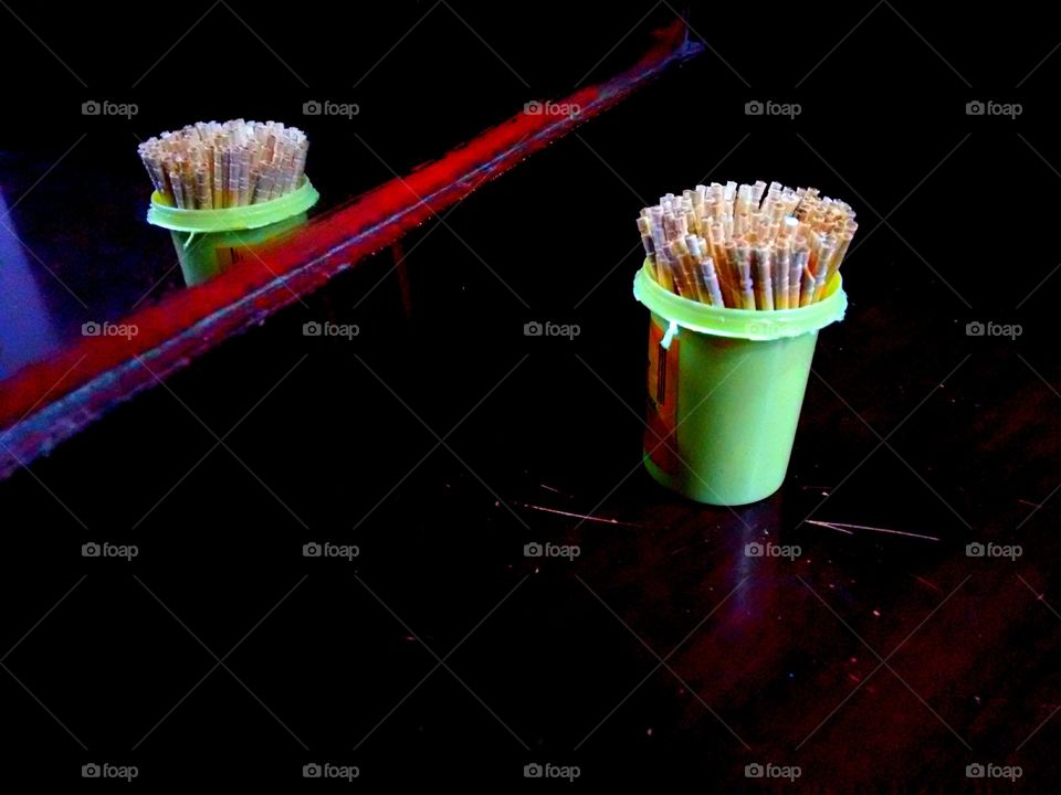 Toothpick stand reflection in the mirror