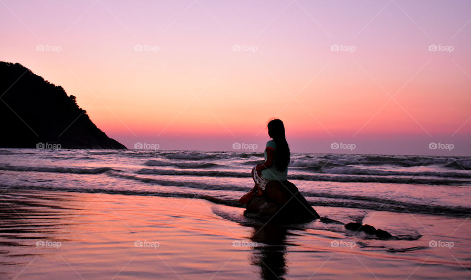 enjoying the sunset seaside gokarna beach