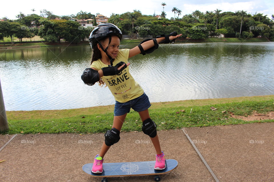 Little girl skateboarding