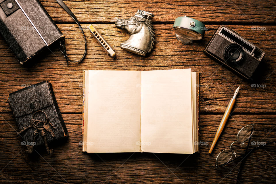 Blank old book opined on the table