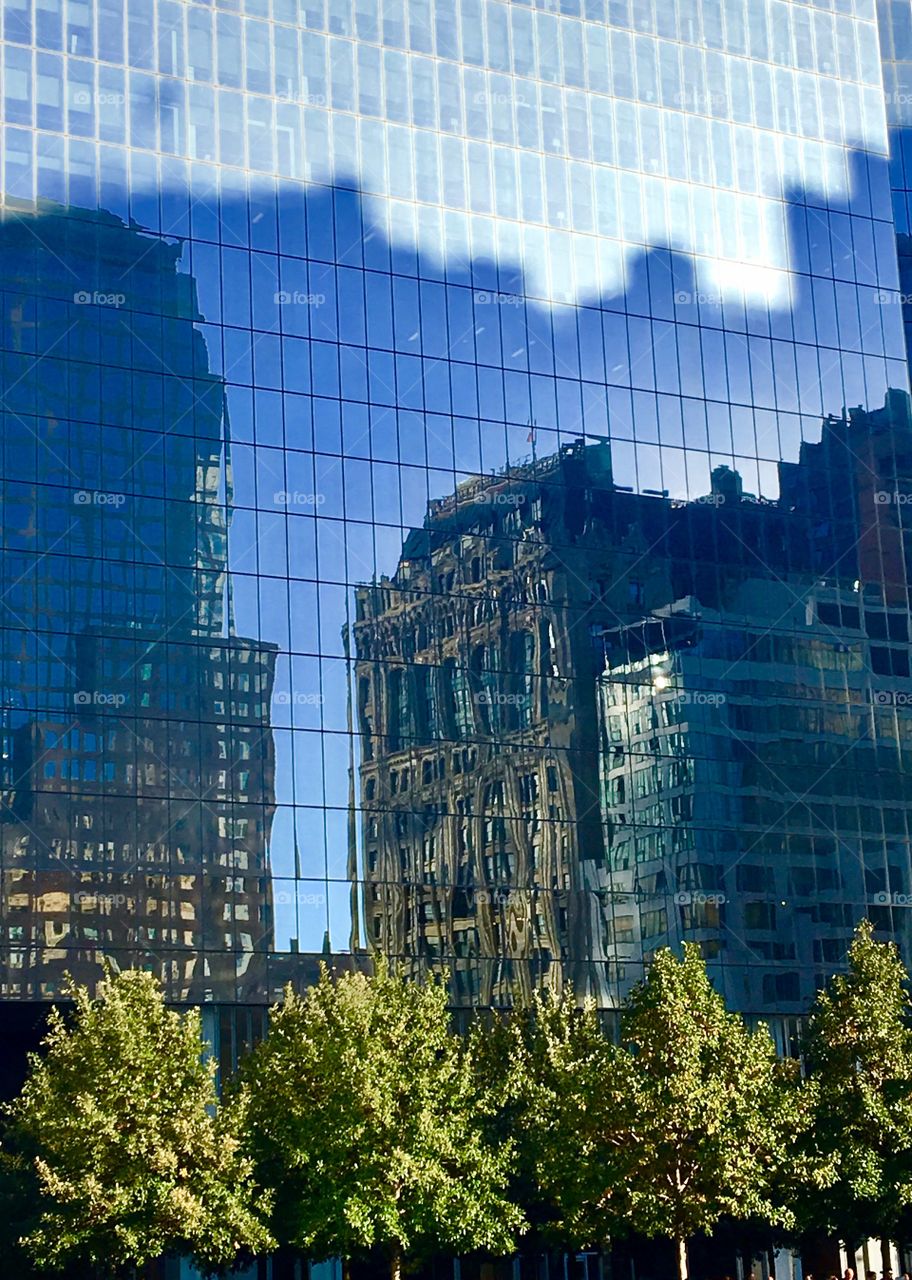 Reflection of building on glass