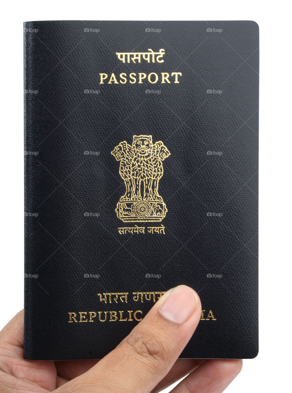 Indian Passport in a hand, India