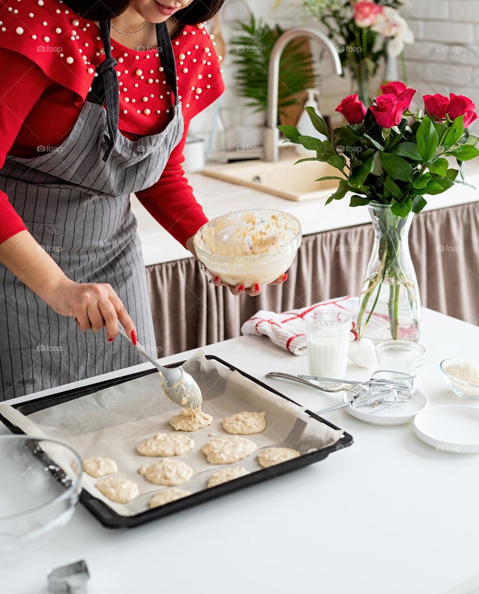 cooking heart shaped cookies at the kitchen