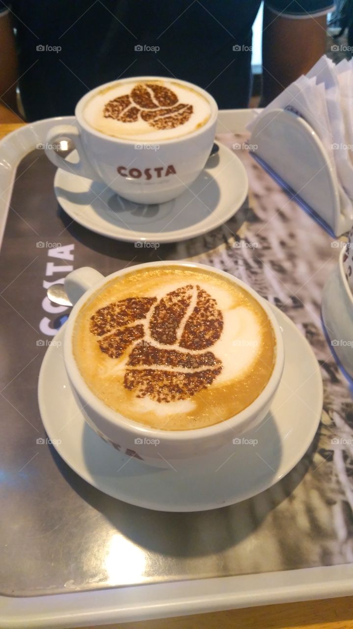 A large cup of coffee and a bright day. I love coffee. Costa coffee, Costa day. Coffee beans.
