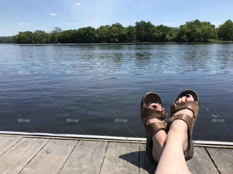 Sitting in the dock of the river