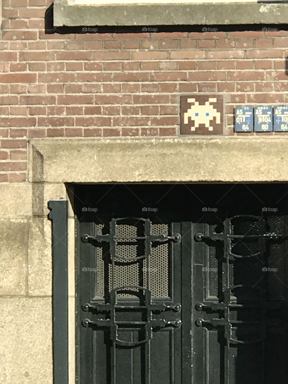 Space invaders 
Door
Outside 
Rotterdam 
Brick
