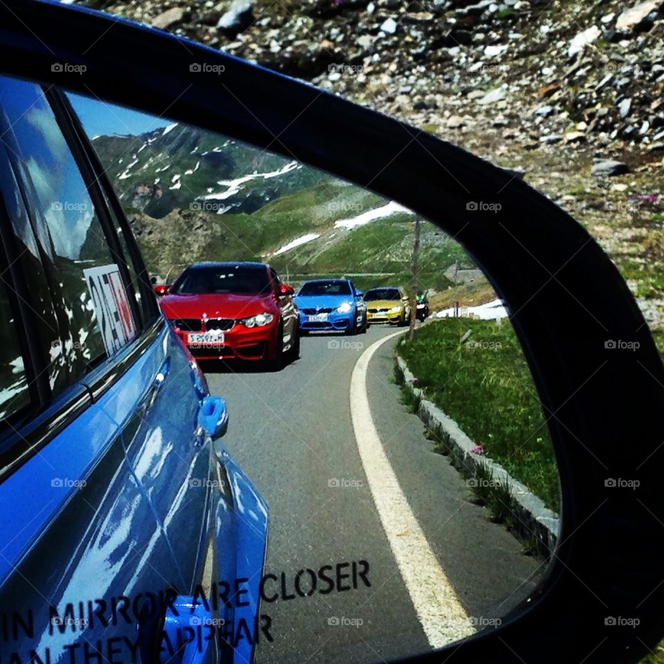 BMW's in the side mirror... M3 & M4's