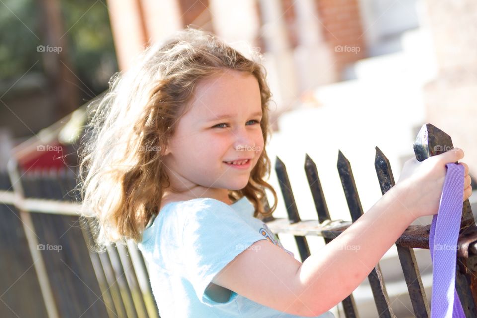 Girl in fence