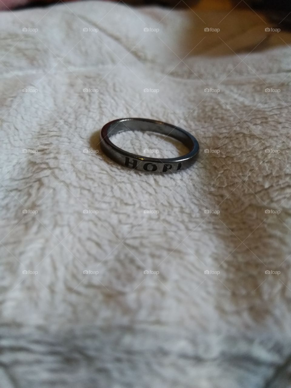 A ring saying hope: something that I really needed and offered comfort in a moment of need. Simple and not even a great picture, but a good message