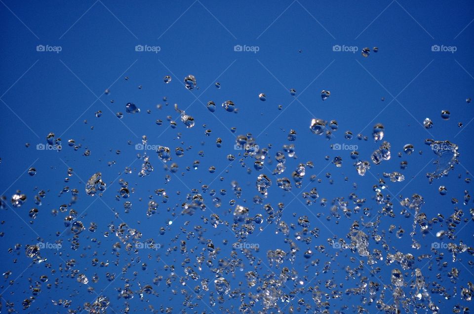 water drops on the blue sky background