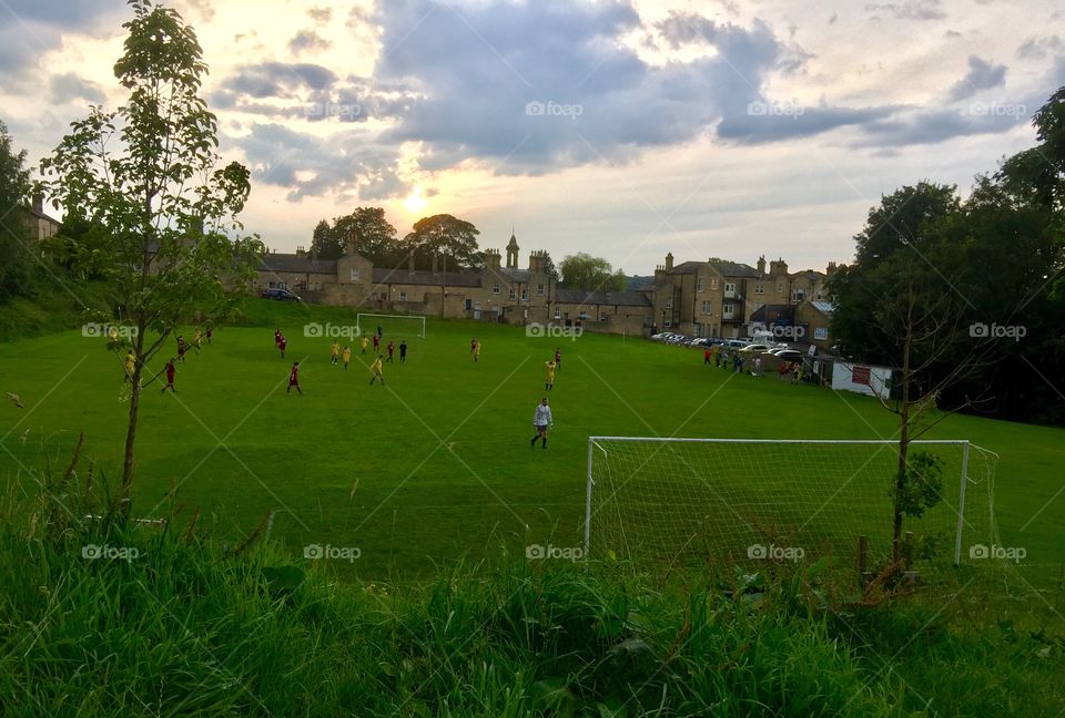 Summer evening football match , England 