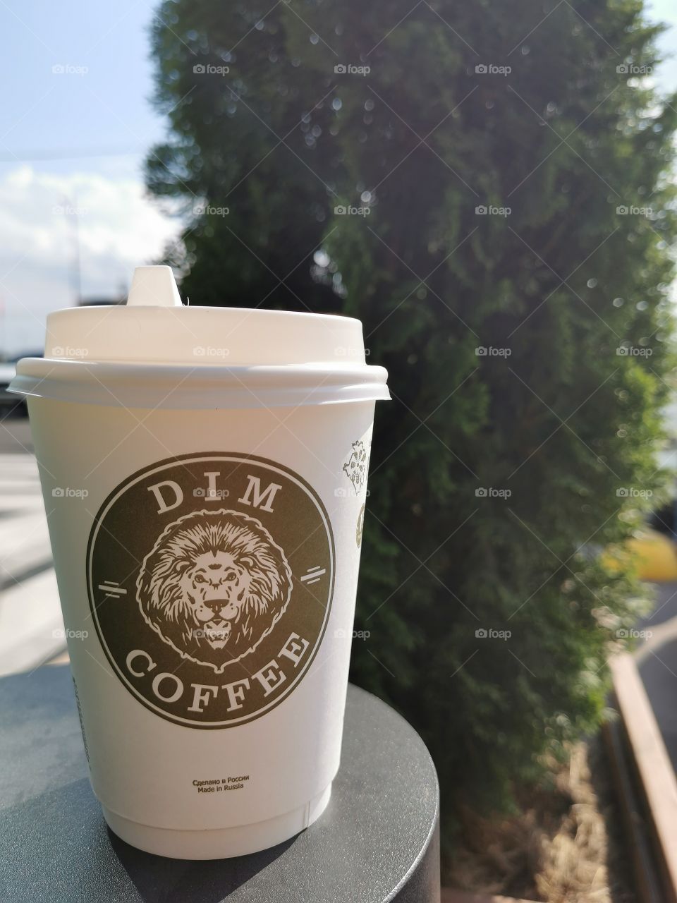 A glass of coffee on a wonderful sunny day. Coffee as a separate art form.