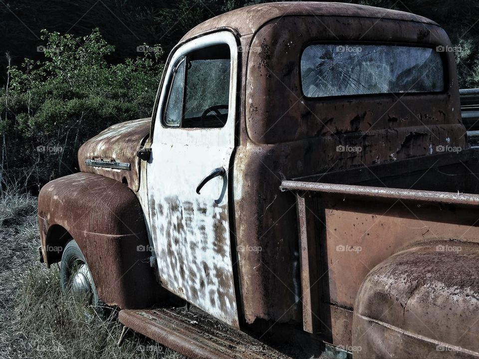 beat up old vintage rusty truck