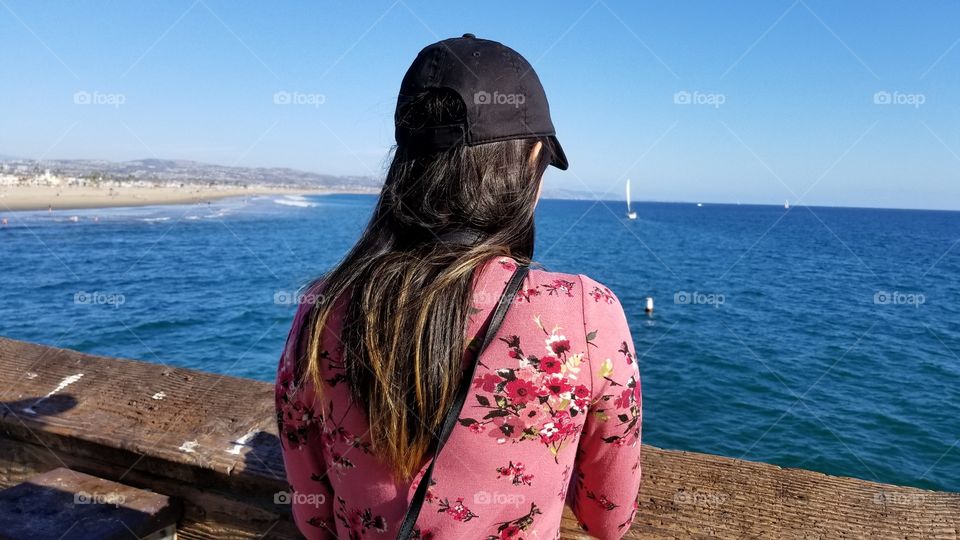 woman looking out the sea view