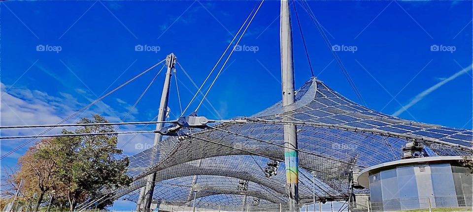 The futuristic structures permeate the stadium constructed specifically for the 1972 Olympics in „Munich“, Germany. Unfortunately the event became enthralled in the tragic assassination of several „Israeli“ teammates. 2022. Hypnotic Productions
