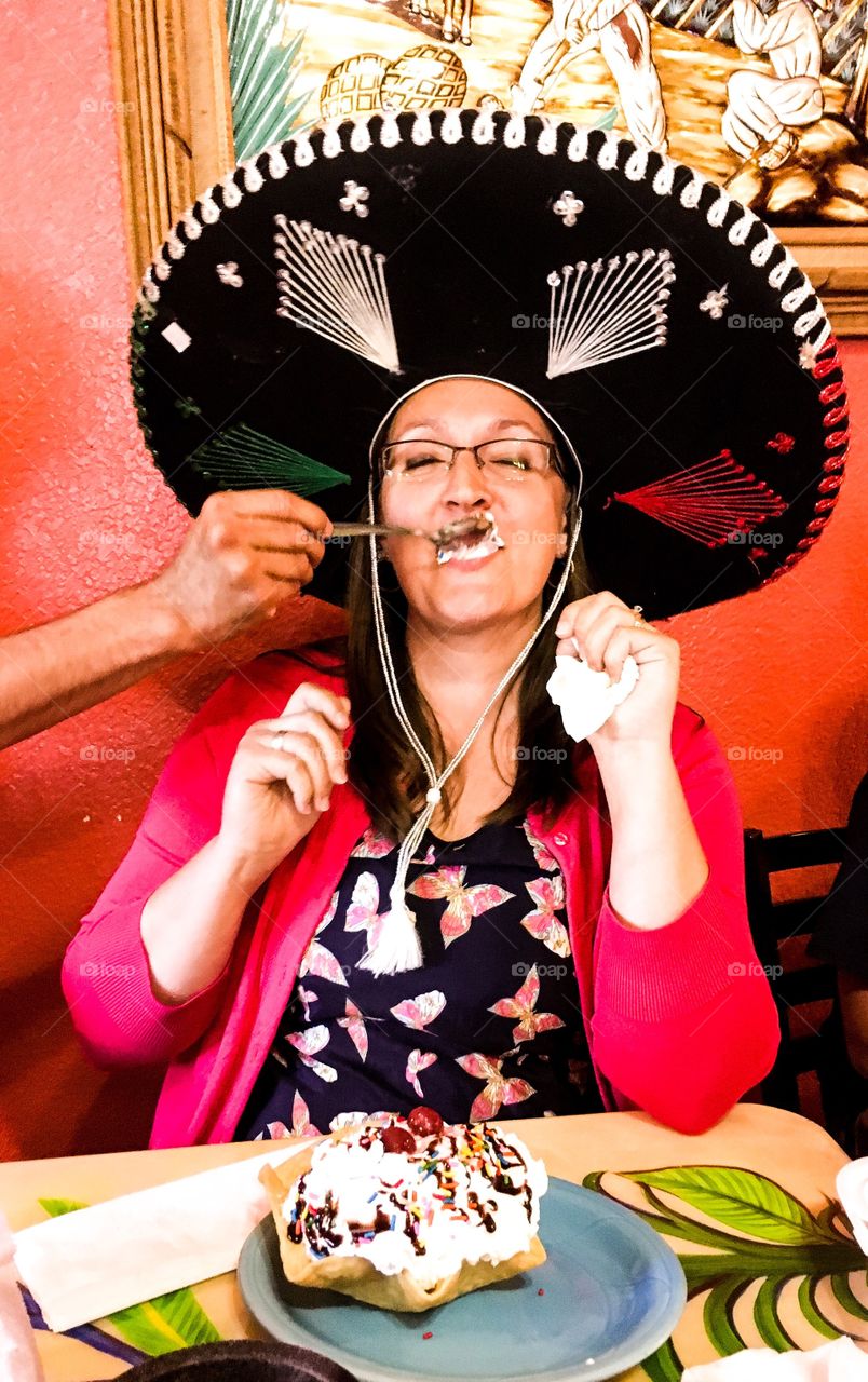 My beautiful wife Tara getting Spoon fed at local Mexican restaurant during birthday 