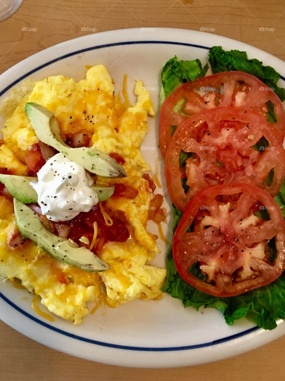 California scramble breakfast. Eggs, jack cheese, salsa, avocado and sour cream. Yum!! 