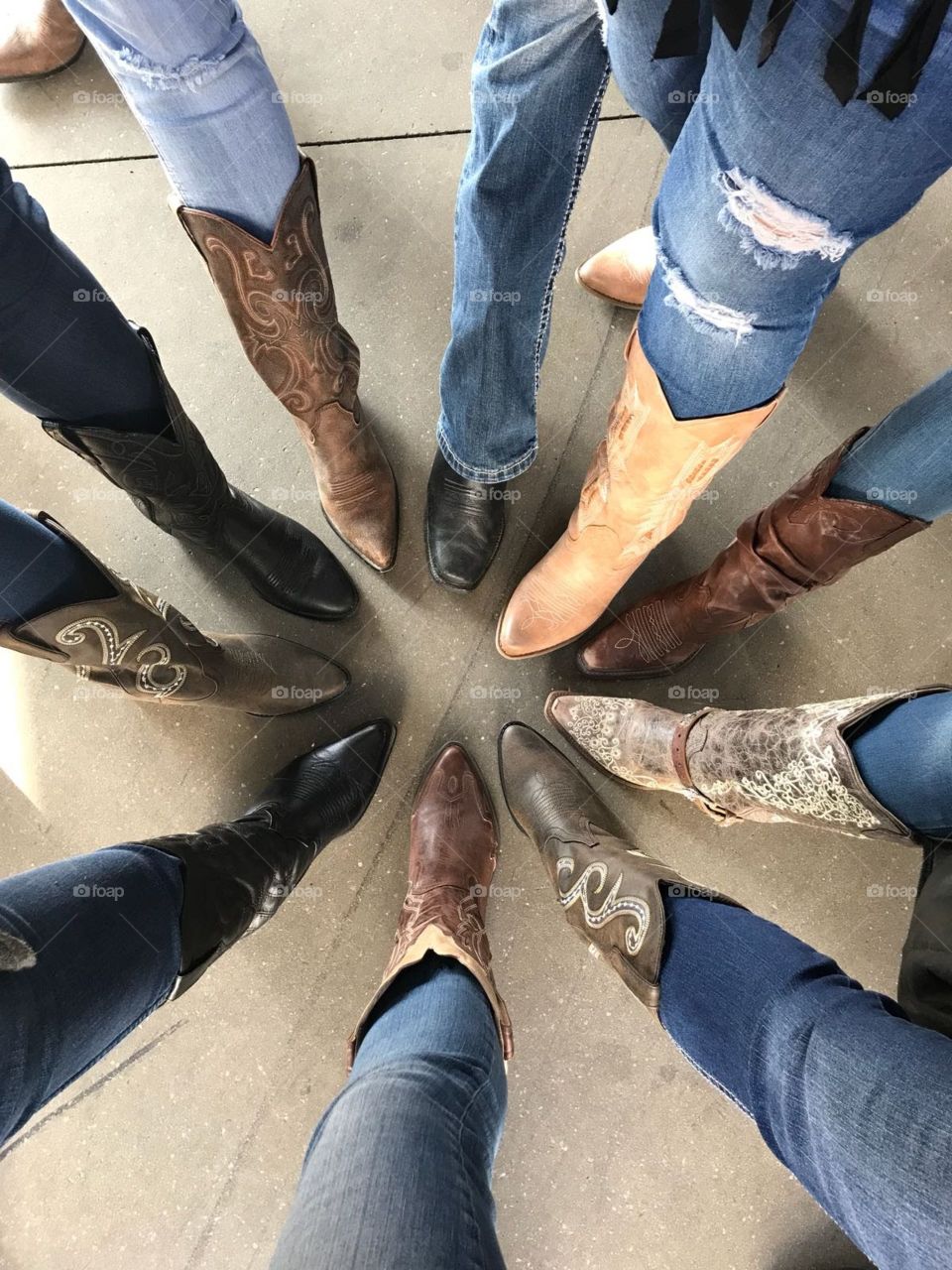 Friends wearing cowboy boots.