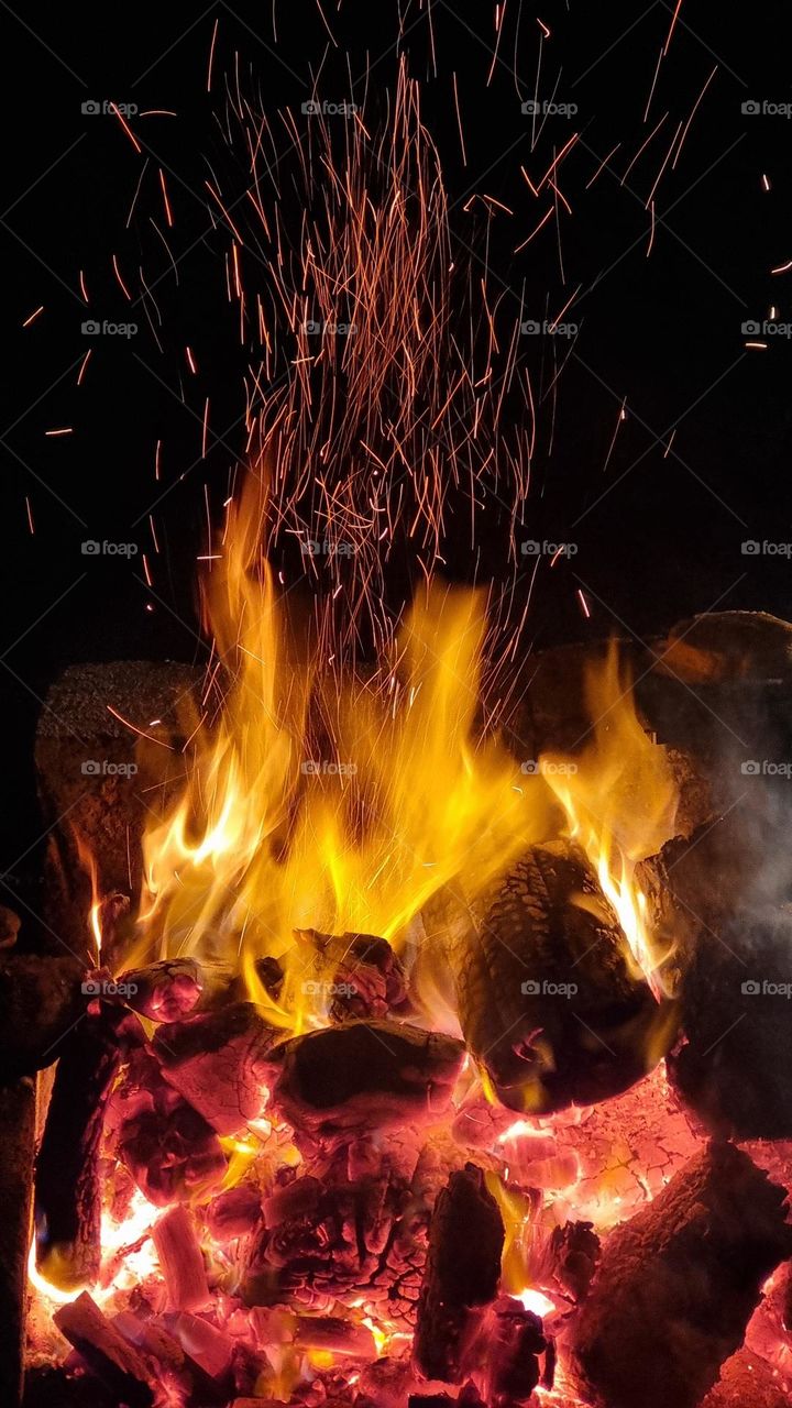 Fire. Watching a campfire is still a pleasure for most of humanity. Watch the sparks dancing with the wind, the wood burning, and listen its sounds while the firewood and time disappear...