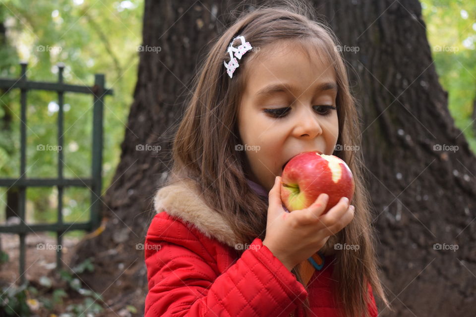 Child eating an apple