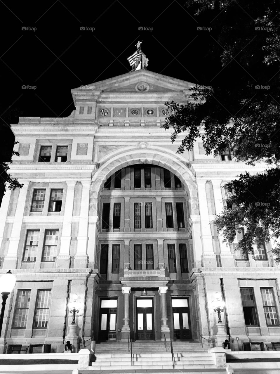 Black and white night photo of the Texas State Capitol in Austin, Texas.