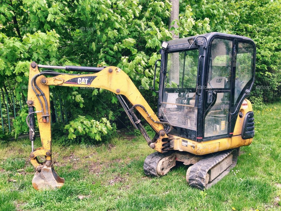 Mechanical 'thing' and nature . One abandoned  machine... 